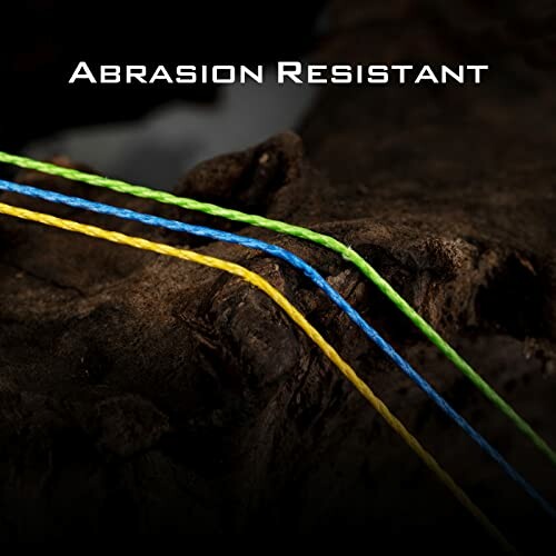 Close-up of abrasion resistant colored lines on a dark surface.