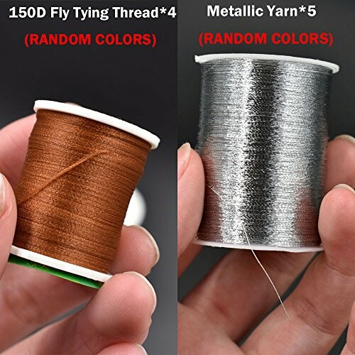 Two spools of thread, one brown fly tying thread and one metallic yarn.