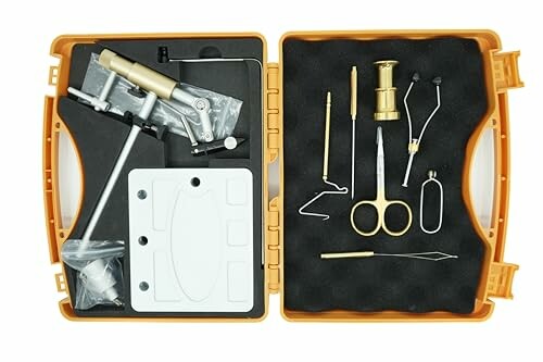 Fly tying tool kit with various tools in a case