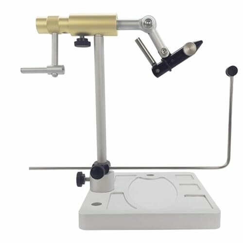 Fly tying vise with adjustable arms and base.